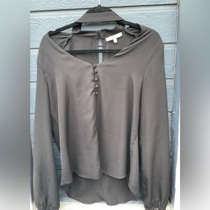 Black WAYF blouse. Cold shoulder mock neck.